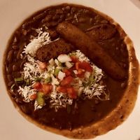 Daily red beans and rice, with vegan sausage (field roast brand) — delicious! at Carmo in New Orleans