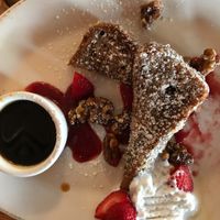 Strawberry French toast with walnuts and coconut cream at Pomegranate Cafe in Phoenix