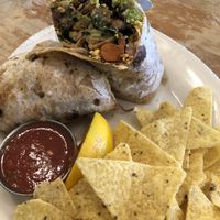 Breakfast burrito with salsa and chips at Pomegranate Cafe in Phoenix