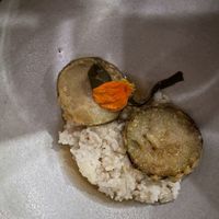 Zucchini tempura, Carolina rice, shio koji, mushroom dashi, pickled kombu at Roselily in South Bend