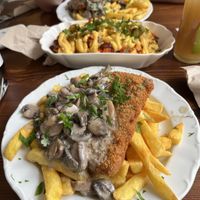 Schnitzel with mushroom gravy/fries and loaded cheesy fries! ♥️♥️♥️  at Rebels in Bamberg