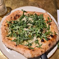 Truffled mushroom pizza with vegan parmesan at Vegitalian - Schoutenstraat in Utrecht
