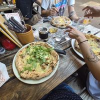 Our mains, the pizza's. One vegan mushroom pizza and 2 quatro formaggi. Vegan cheese is coconut oil based. It melts well and tastes good. at Vegitalian - Schoutenstraat in Utrecht