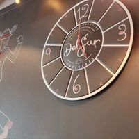 Clock inside DelSur at DelSur Empanadas in Minnetonka