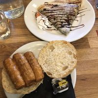 Vegan sausage roll and strawberry chocolate crepe  at Wanderlust Cafe & Bistro in Edinburgh