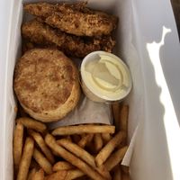 wpbc box with maple mustard.  at Winter Park Biscuit Company in Orlando