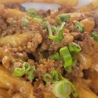 Good portion of tasty loaded fries. at Winter Park Biscuit Company in Orlando