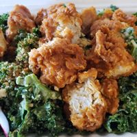 Kale Caesar Salad with Buffalo Tenders at Winter Park Biscuit Company in Orlando