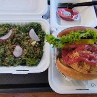 Kale Caesar Salad with Crispy Chik Sandwich al fresco at Winter Park Biscuit Company in Orlando