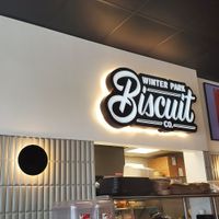 sign and kitchen at Winter Park Biscuit Company in Orlando