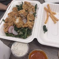 Kale salad with chicken tenders  at Winter Park Biscuit Company in Orlando