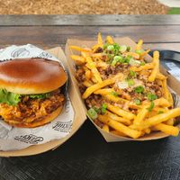 Crispy chick sandwich with loaded fries at Winter Park Biscuit Company in Orlando