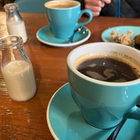 Coffee w oat milk   at Koda Coffee in Scarborough