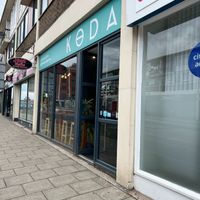 Exterior- conveniently located right across from the train station. at Koda Coffee in Scarborough