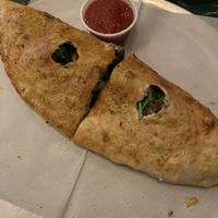 Spinach mushroom calzone  at Daytona Pizza & Wing Co in Daytona Beach