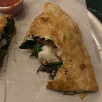Spinach mushroom calzone  at Daytona Pizza & Wing Co in Daytona Beach