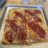 Pizza with onions and honey   at Alternate Ending Beer Co in Matawan