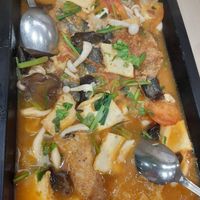 Grilled housemade mock fish in tomato broth at Lotus Vegetarian 莲心 - Novena in Central Singapore