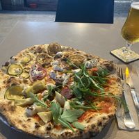 Vegan pizza with artichokes  at MadreLievito in Barcelona