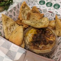 Pita bread and hummus at Neat - Camden in North West London
