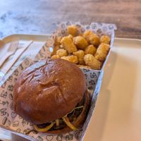 Veggie crunch burger and tater tots at Neat - Camden in North West London