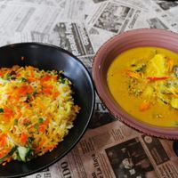 Rice and veggies in mango sauce at Little India in Boadilla Del Monte