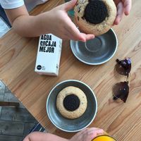 Galletas y zumo natural de naranja  at We The North in Tenerife