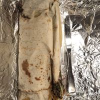 Knife to show scale of “baby” Gordito sans dairy  at Gorditos in Seattle