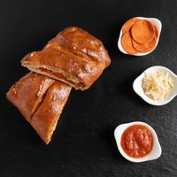 Vegan pepperoni calzone is available now! at Sarpino's Pizzeria in Fort Lauderdale