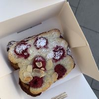 bostock: so so delicious! Soft inside, crunchy on the outside & not too sweet with a pleasant balance of the raspberries 💟 (12zl)  at Eter Vegan Bakery in Warsaw