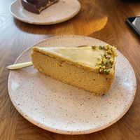 Pistachio and chocolate cake   at Eter Vegan Bakery in Warsaw