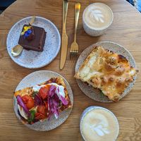 Pesto and tomato focaccia and an OKONomiyaki sandwich at Eter Vegan Bakery in Warsaw
