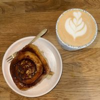 Sticky almond pastry & rose latte   at Eter Vegan Bakery in Warsaw