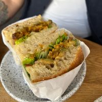 sandwich with fried mushrooms  at Eter Vegan Bakery in Warsaw
