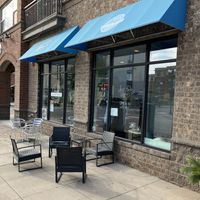 Exterior November 2024 with outside seating at Amy's Cupcake Shoppe in Hopkins