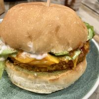 Pretty Mad burger. Pumpkin & chickpea patty, cheese, lettuce, tomato, avocado, red onion, tomato relish, aioli.  at Mad Benji in Berwick