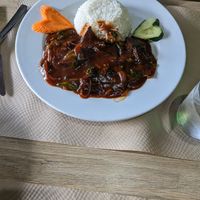 Seitan in sauce with rice at Vegan Food Heaven in Barcelona