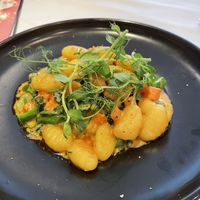 Gnocchi with sweet potato and veg in thai red curry coconut sauce  at Oolaa - Stanley St in Hong Kong Island