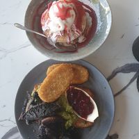 Dairy strawberry pancakes and the Avocado/mushroom smash made vegan at Tilly Divine Kitchen & Bar in Warrnambool
