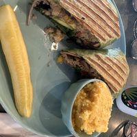 Vegan Mexican burrito in a spinach wrap with vegan grits   at get REAL cafe in Sturgeon Bay