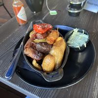 Roasted potatoes with herb aioli  at Honey Uninhibited in Miami