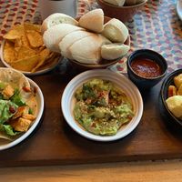 Sweet potato taco, guacamole, potatoes bravas. Served with tortilla chips and sliced ciabatta   at Lounges - Sentado Lounge in Sittingbourne