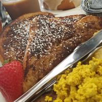 Brunch. Homemade french toast, tofu scrambled and Beyond sausage patty. Iced coffee. Cinnamon bun. at JMT Vegan Eats in Virginia Beach