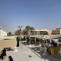 Stalls and seating  at Torba Farmers Market  in Doha