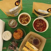 Noodles, cranberries, doughnut, tofu sandwich, chocolate date, walnut chocolate spread: all vegan 🤤 at Torba Farmers Market  in Doha