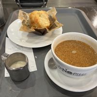 Americano with curdled milk and partially eaten muffin!   at No Filter Coffee in Lytham St Annes