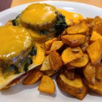 Vegan eggs Benedict with potato wedges at Cheezy Vegan in Woodlyn