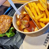 Special Burger and Currybanger. My non-vegan friend felt in love with the burger. at UNMEAT in Zurich