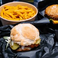 Vish burger, rösti & bacon, community fries at UNMEAT in Zurich
