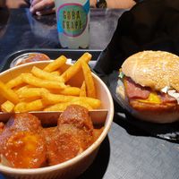 Currybanger amd chips; Rosti vacon burger at UNMEAT in Zurich